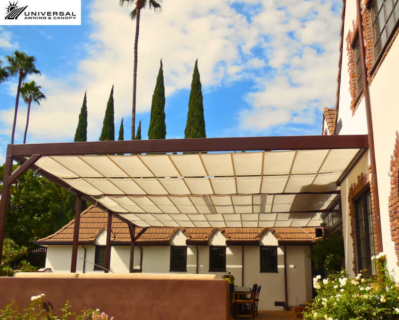 Slide-on-wire canopy at a residential property, alternate project view