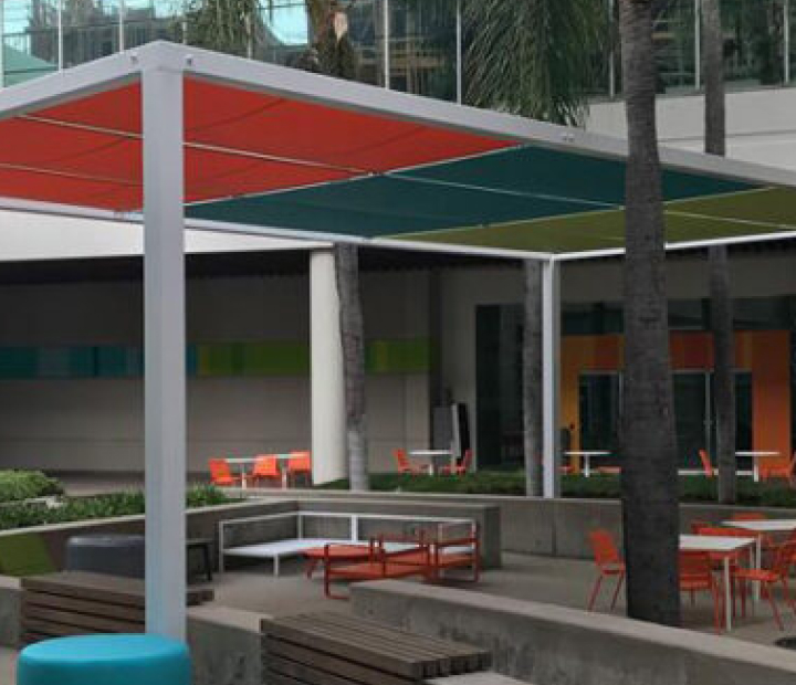 Colorful fabric patio cover above outdoor seating, Orange County