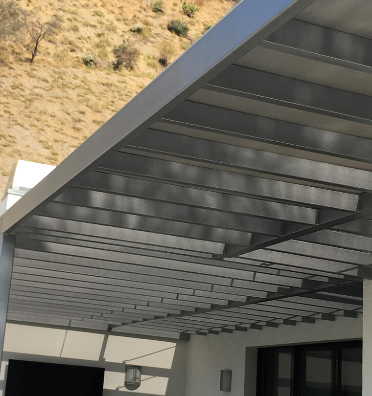 Steel entrance canopy with custom copper trim, San Diego County
