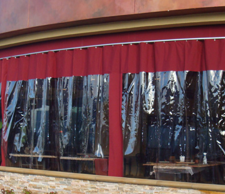Red fabric patio curtains with clear window panels, Orange County