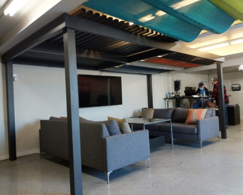 Freestanding aluminum trellis over an outdoor lounge, Ventura County