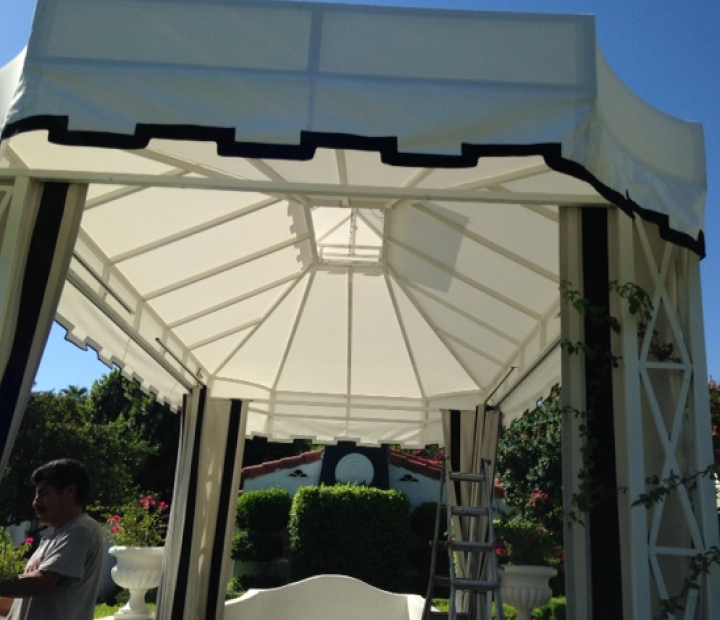 Interior view beneath a white fabric cabana roof, Ventura County