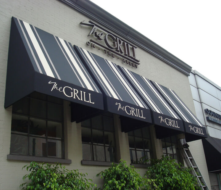 Striped storefront awnings at The Grill restaurant, Ventura County