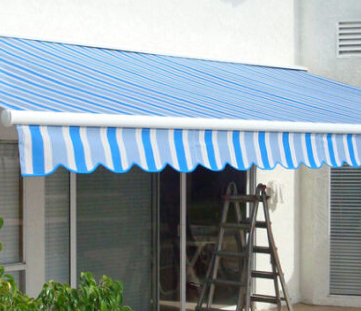 Extended blue-and-white retractable awning, Orange County