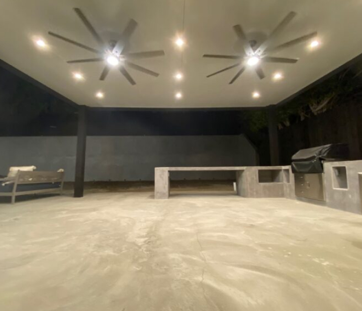 Illuminated aluminum patio cover over an outdoor kitchen, Ventura County