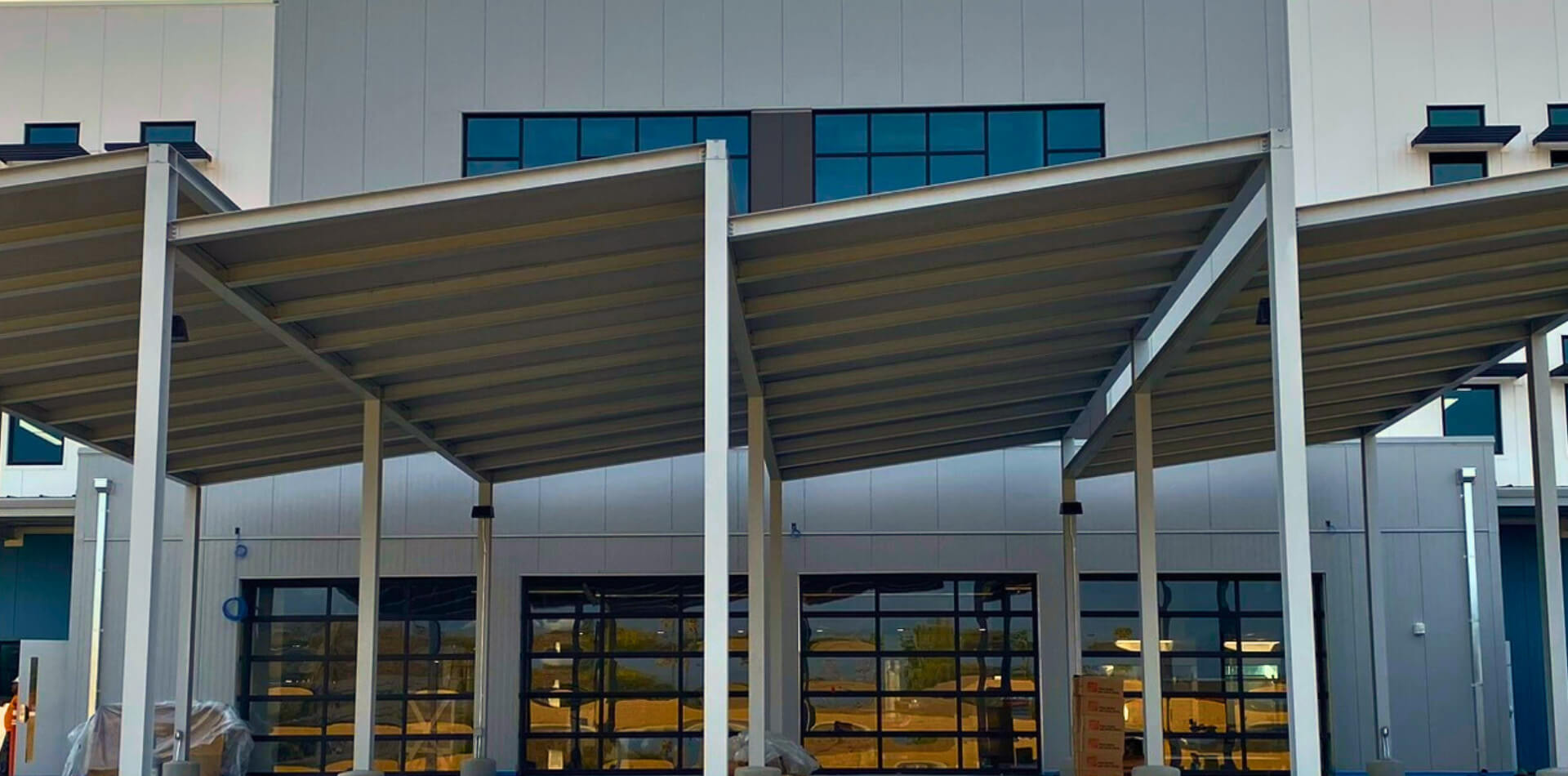 Large metal shade canopies on a commercial property