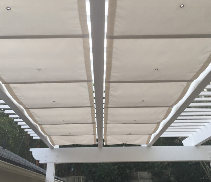 White slide-on-wire canopy panels viewed from below, San Diego County