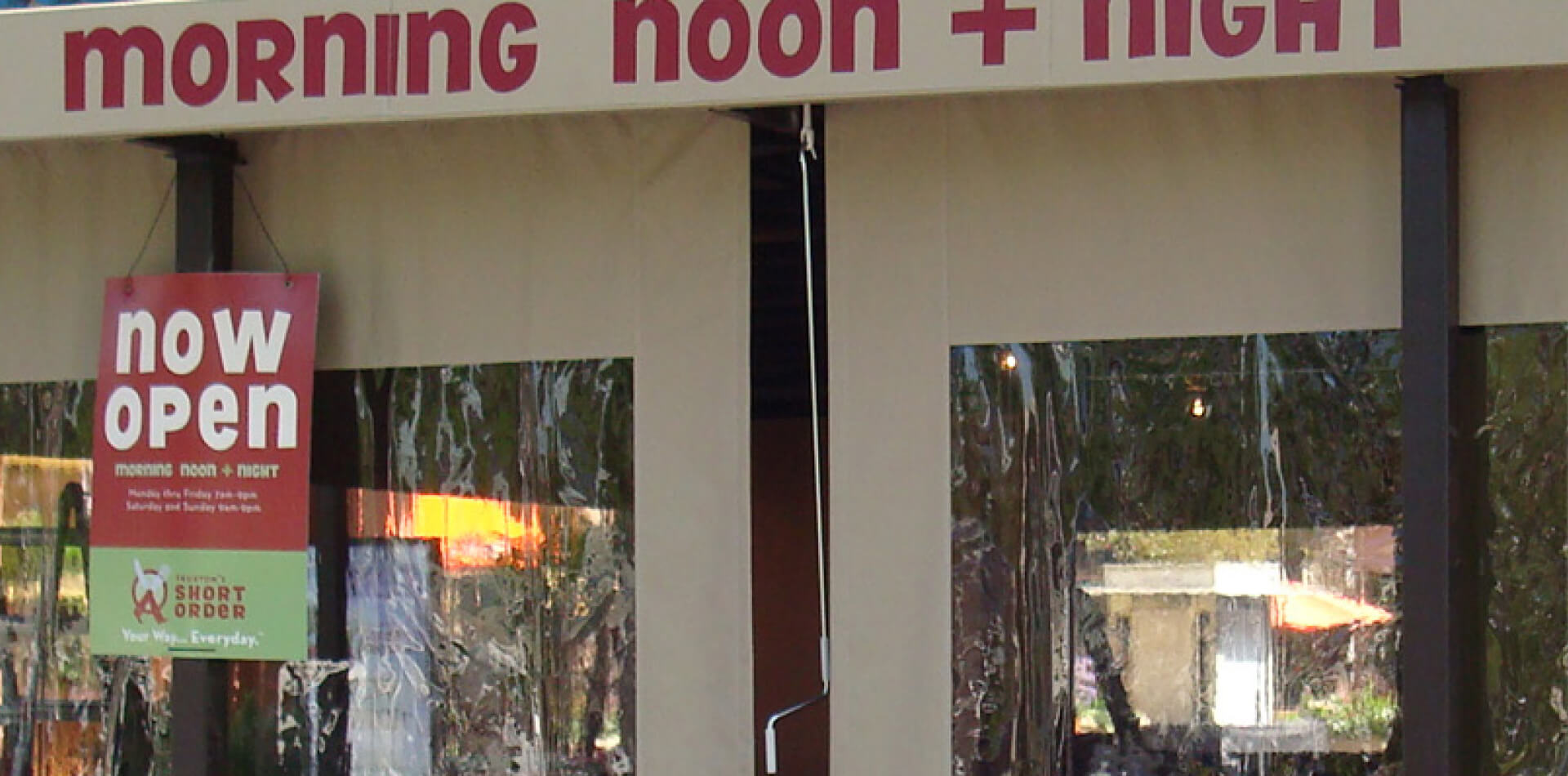 Clear outdoor drop-down shade at Morning Noon + Night, Ventura County