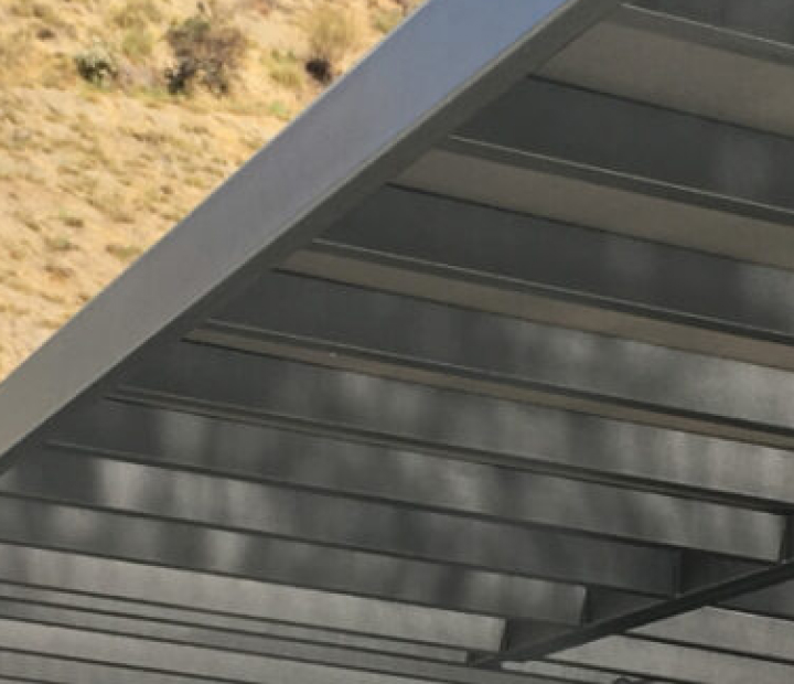 Close view beneath a metal trellis roof, Riverside County