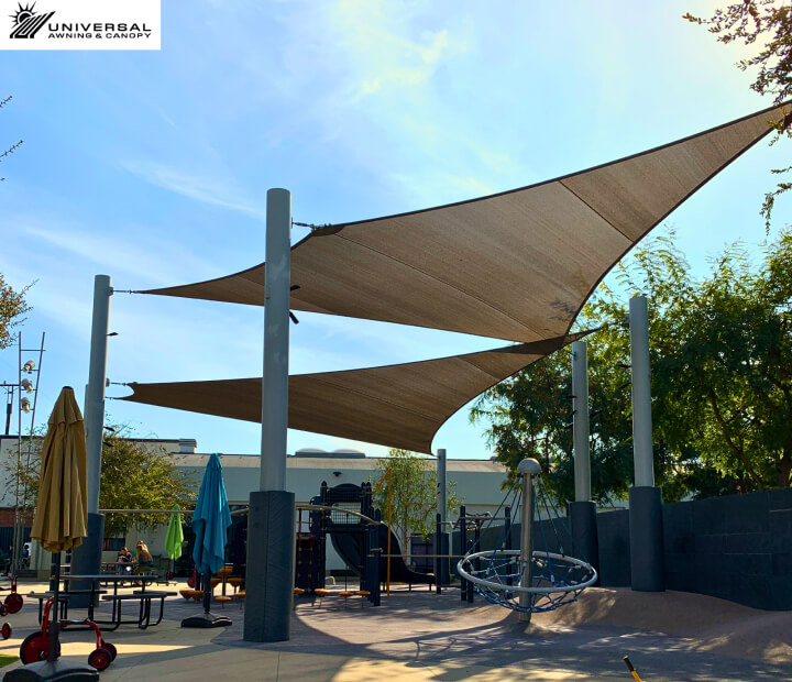 Tensioned shade sail at a commercial property