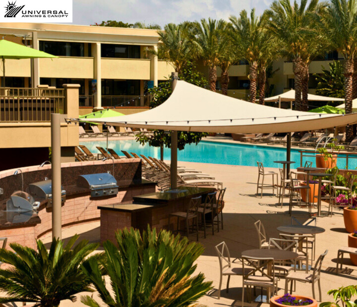 Tensioned shade sail at a hotel property