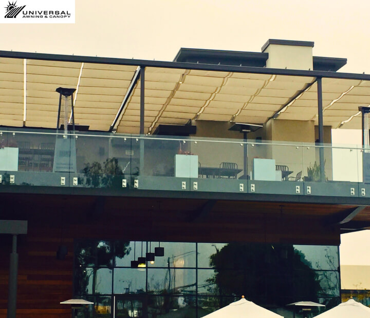 Slide-on-wire canopy at a commercial property