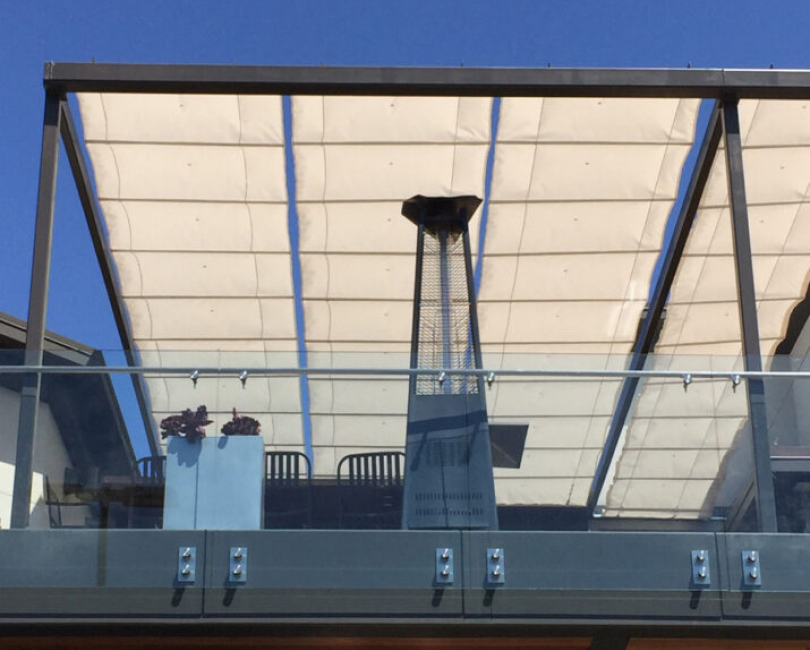 White slide-on-wire canopy panels on a steel frame, San Diego County