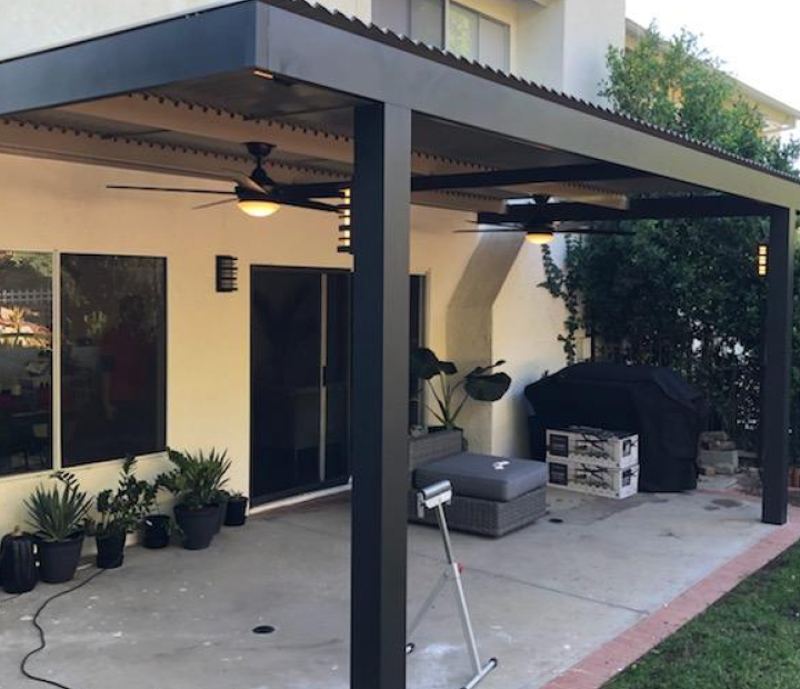 Dark aluminum trellis covering a residential patio, Ventura County
