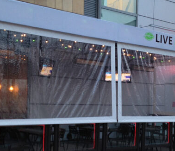 Clear curtains enclosing a commercial patio, Orange County