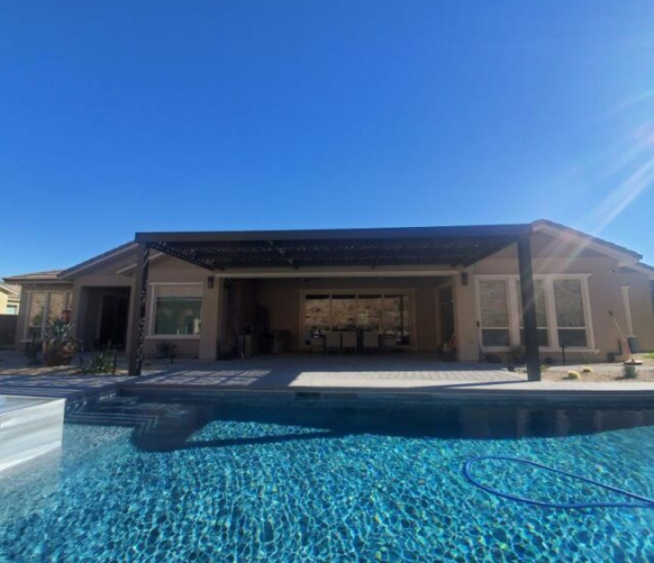 Solid-roof aluminum patio cover beside a pool, Ventura County