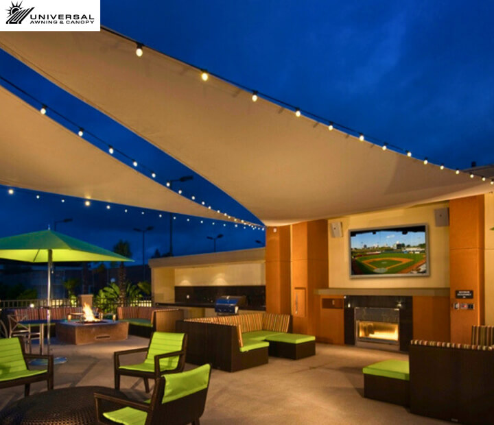 Tensioned shade sail at a hotel property, alternate project view