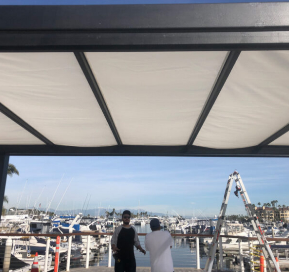 Metal trellis with fabric shade panels at a marina, Riverside County