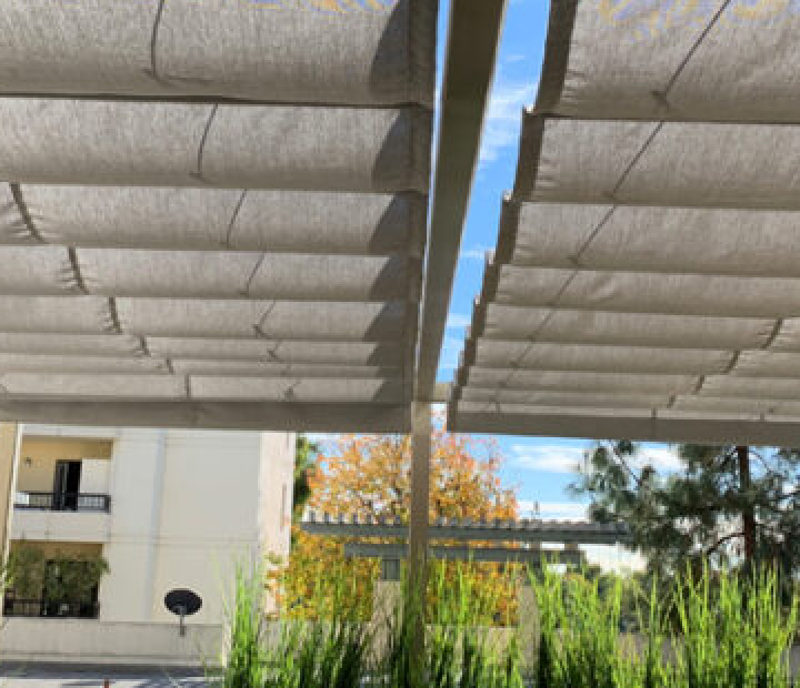 Paired fabric canopy panels on slide wires, San Diego County