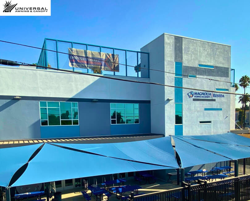 Tensioned shade sail at a commercial property, installation view