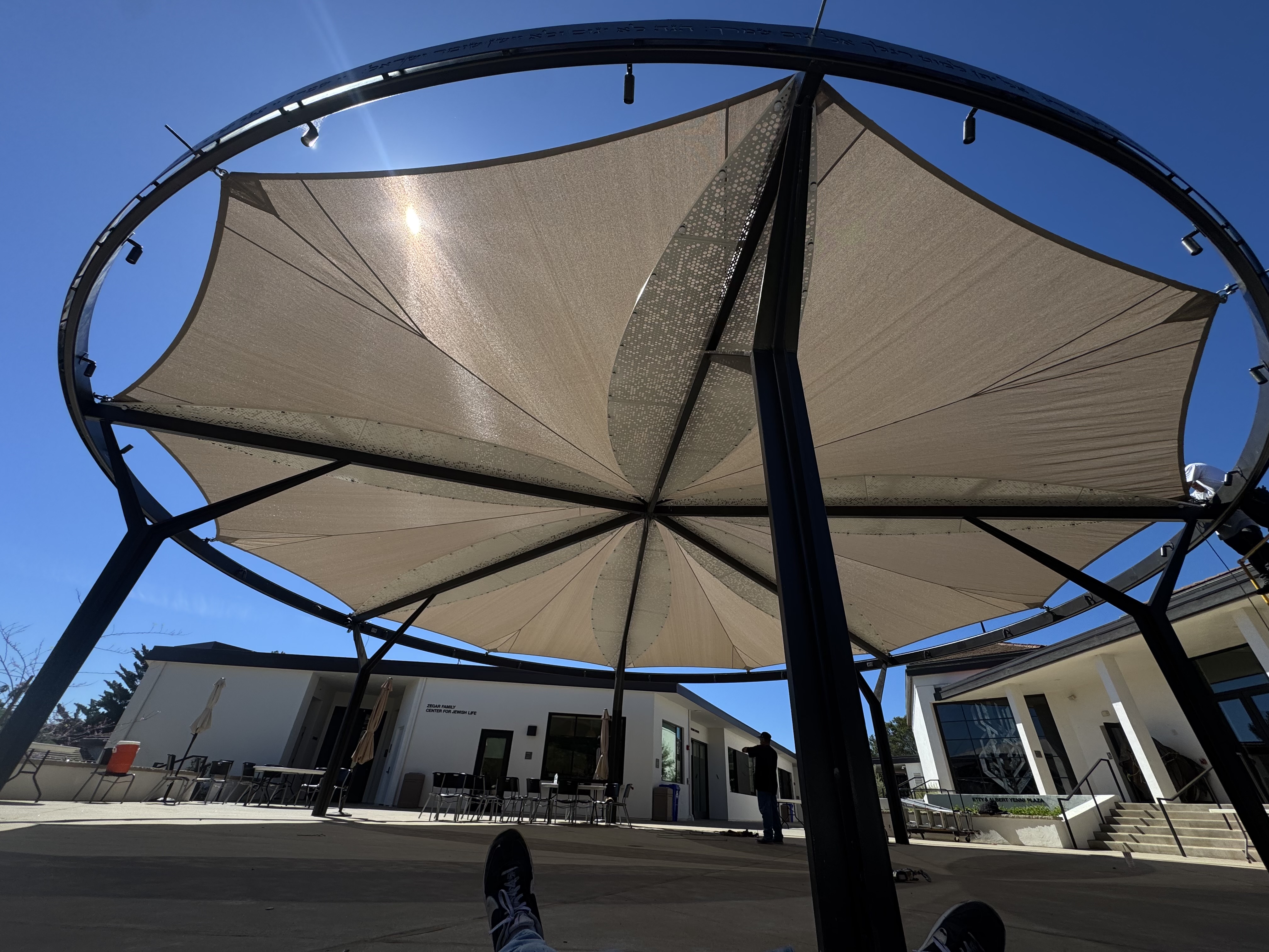 Underside detail of the custom fabric and steel canopy at a B'NAI campus