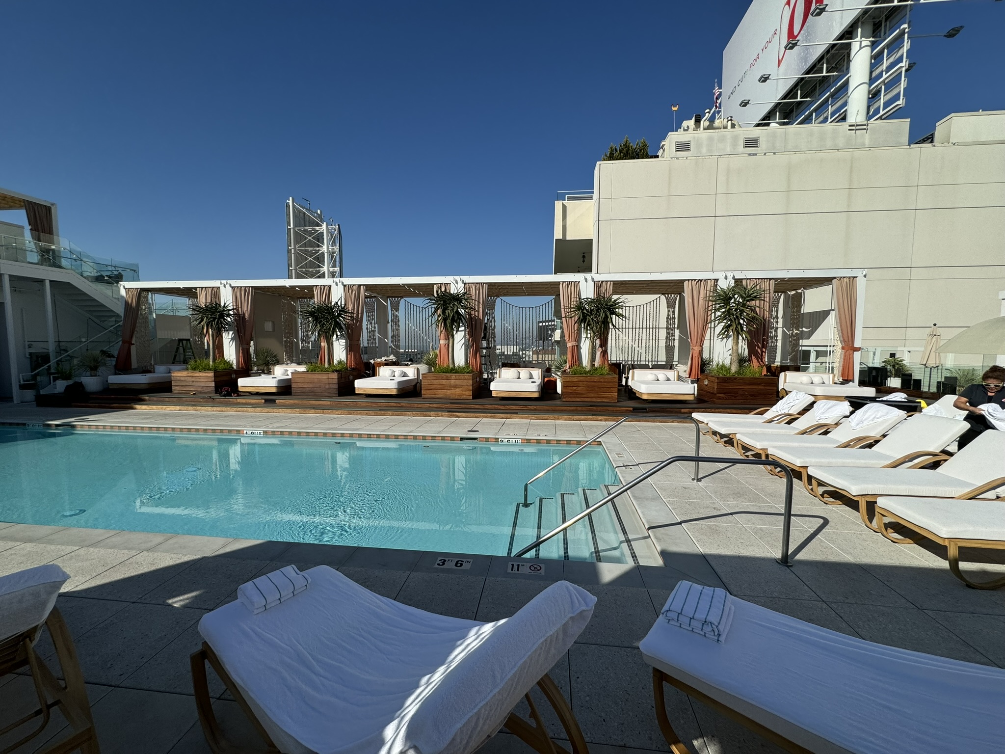 Custom cabanas lining the rooftop pool at W Hollywood