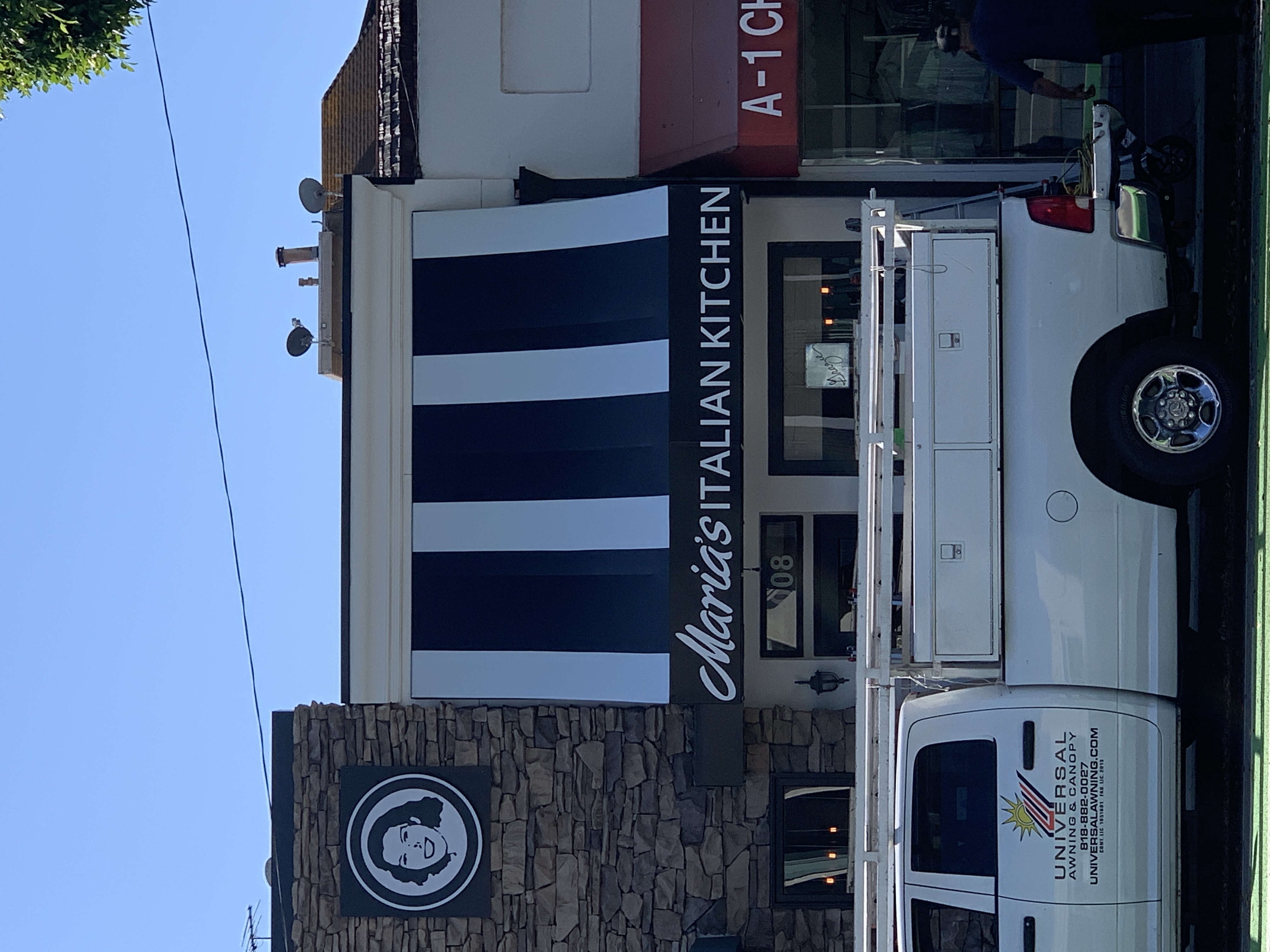 Fixed restaurant awnings at Maria's Italian Kitchen in Santa Monica