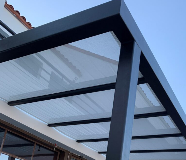 Black metal trellis frame with translucent panels, Riverside County