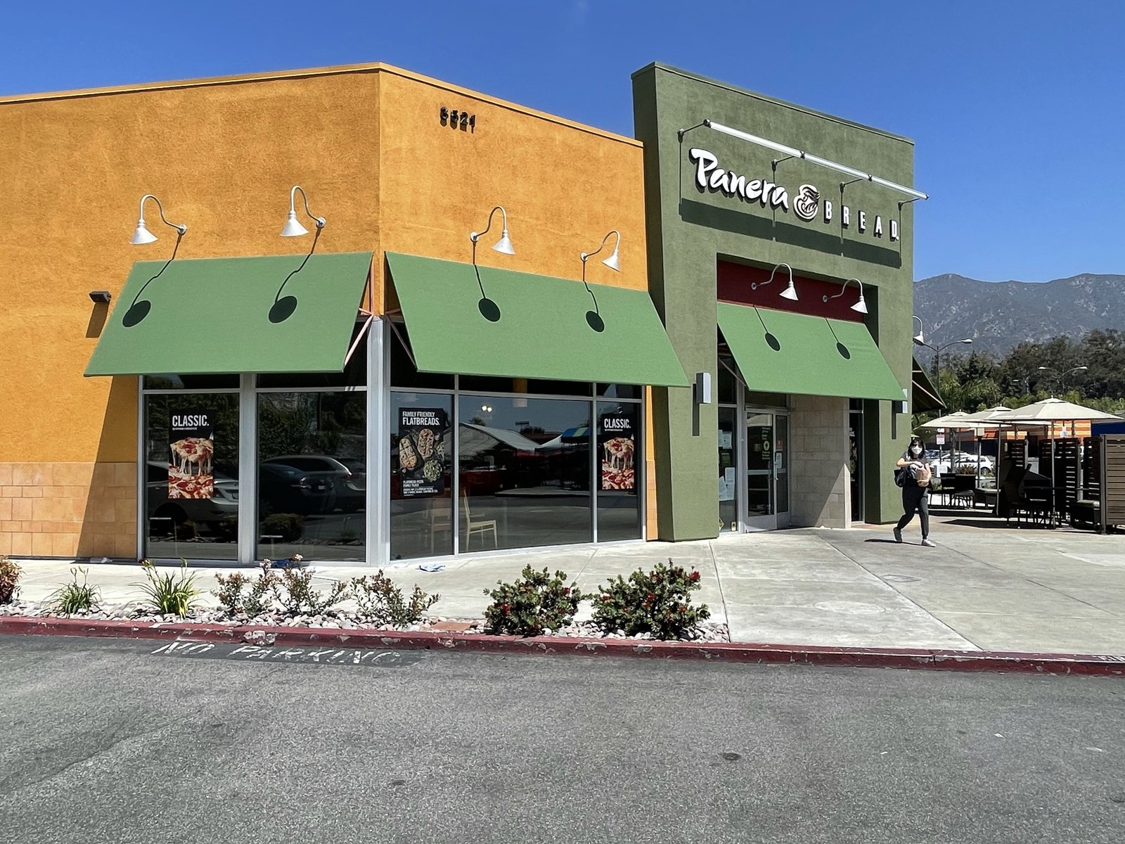 Green commercial fabric awnings installed at Panera Bread in Pasadena